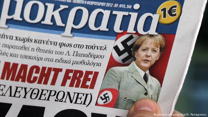 Ангела Меркель со свастикой на рукаве на первой страницы греческой газеты
