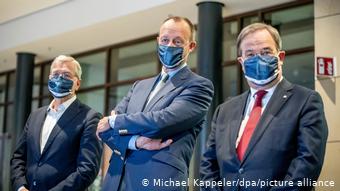 Кандидаты на пост председателя ХДС Рёттген, Мерц и Лашет в масках
