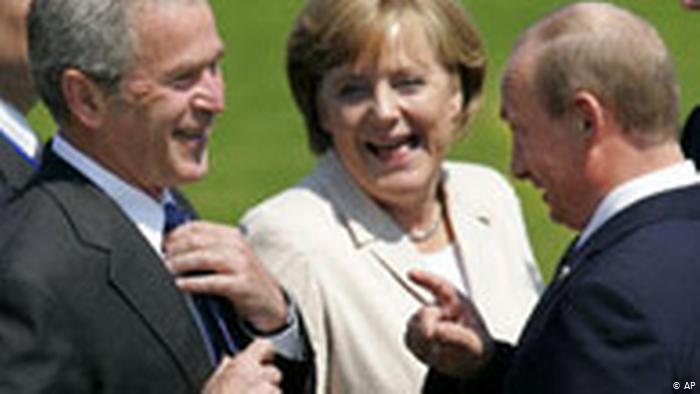 Джордж Буш, Ангела Меркель и Владимир Путин