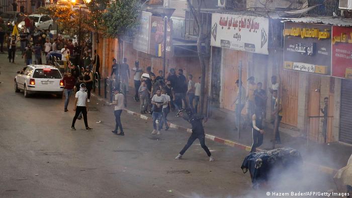 Столкновения между палестинскими протестующими и израильскими службами безопасности в городе Хеврон, 12 мая 2021 года