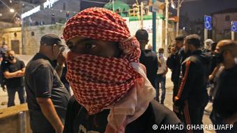 Палестинец во время столкновений в Лоде, 13 мая 